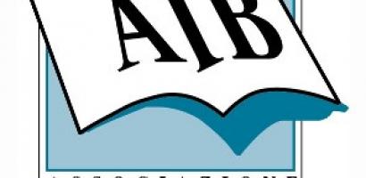 scritta aib su libro bianco aperto